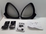 a pair of black cat eyes on a white table