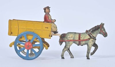 un cheval en jouet tirant une charrette sur laquelle se trouve un homme