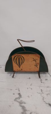 a small wooden box with a design on it