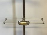 an image of a metal stand with a glass shelf
