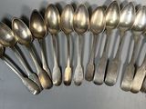 a lot of spoons and spoon spoons on the table