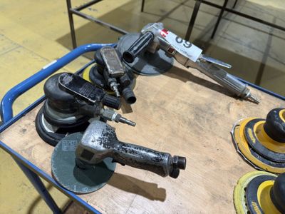 some tools are sitting on a table in a room