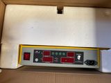 a box with an electronic device inside of it