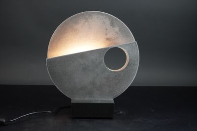 NICOLOF (né en 1969). Lampe "Orbe" en inox et bois.