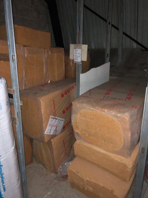a lot of boxes that are stacked up in a room