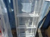 a ladder that is sitting in the middle of a pile of boxes