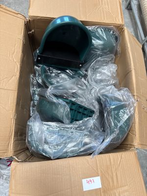a box with some items in it on the ground