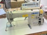a sewing machine that is sitting on a table