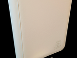 a white binder with a small square in it