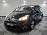the black citrole is parked on a checkered floor