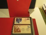 a red folder with a picture inside of it on a desk