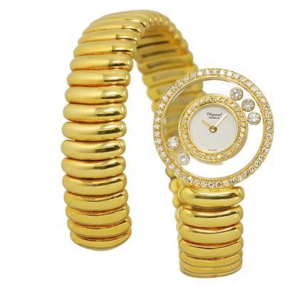 an image of a woman ' s wrist watch with a gold bracelet