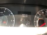 a close up of a car dashboard with a speedometer and gauges