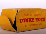 a yellow box that has some kind of toy inside of it
