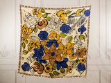 a wall hanging with a floral design on it