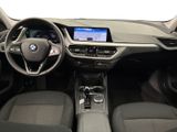 the interior of a car with a steering wheel and dashboard