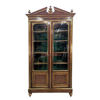 an image of a wooden bookcase with glass doors