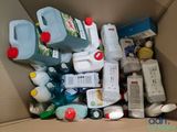 a box full of cleaning products and other household items