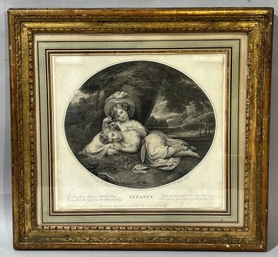 an old picture of a woman and child in a wooded setting