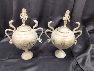 pair of antique cast iron urns with handles and handles