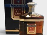 the bottle of louis royer xo is next to a box