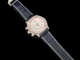 an image of a close up of a wrist watch on a black background