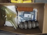 a cardboard box with a bunch of items inside of it