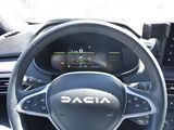 the interior of a car with a steering wheel and a dash board