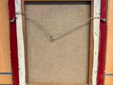 an old picture frame with a clock hanging on the side of a wall