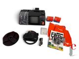 the contents of a camera are laid out on a white surface