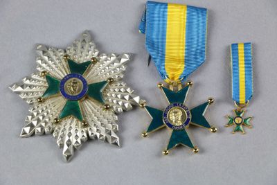 deux médailles et une étoile sur un fond blanc