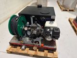 a picture of a water pump sitting on a pallet