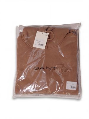 the shirt is brown and has a black logo on it