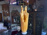 a vase that is sitting on a table in a room
