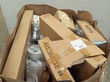 a cardboard box full of bottles and cans on the floor