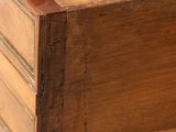 a wooden box with a drawer inside of it
