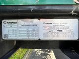 a close up of the back end of a green golf cart