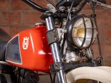 a close up of a motorcycle with a light on it
