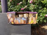 a cardboard box with a bunch of baskets on top of it