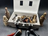 a suitcase with various tools in it on a table