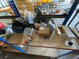 a table with many items on it in a warehouse
