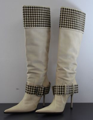 white high heel boots with black and white checkered trims