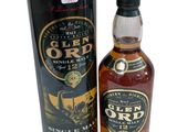 une bouteille de whisky single malt Glen Ord à côté d'une boîte noire