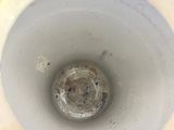 a close up of a blender with a mixture in it