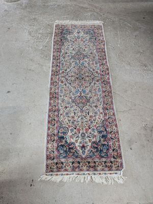 a rug is laying on the floor in a room