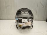 an image of a helmet with a sticker on it sitting on a table