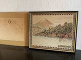 a picture of a picture of a mountain in a box