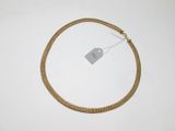 a close up of a gold necklace with a tag on it