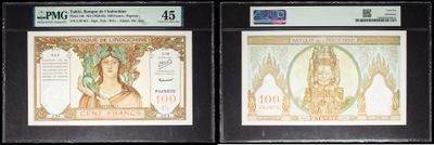 three different types of currency are on display in a display case