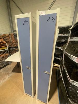 two lockers that are in the middle of a room